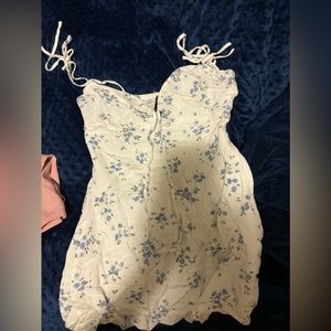 White dress with blue flowers